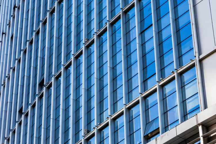 Aluminium frame supporting double-glazed glass panels for improved energy efficiency